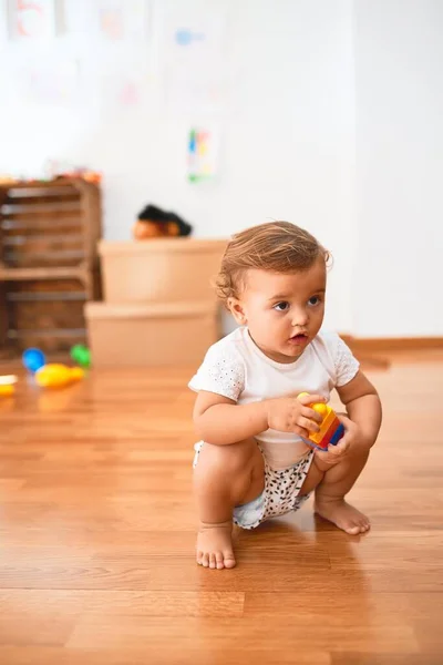 Adorable Toddler Playing Building Blocks Lots Toys Kindergarten — Stock Photo, Image