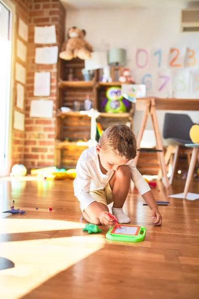 Beautiful Blonde Toddler Drawing Using Digital Board Lots Toys Kindergarten — Stock Photo, Image