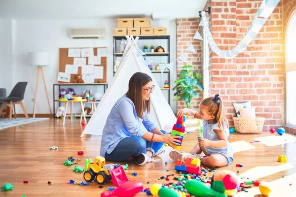 Caucasian Girl Kid Playing Learning Playschool Female Teacher Mother Daughter — Stock Photo, Image