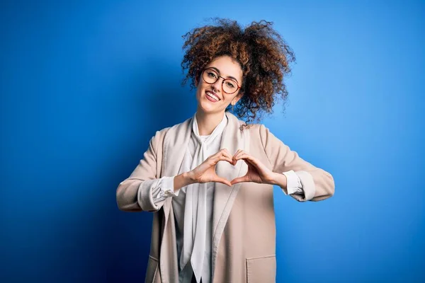 Young Beautiful Businesswoman Curly Hair Piercing Wearing Jacket Glasses Smiling — Stock Photo, Image