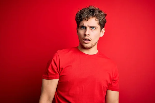 Young Blond Handsome Man Curly Hair Wearing Casual Shirt Red — Stock fotografie