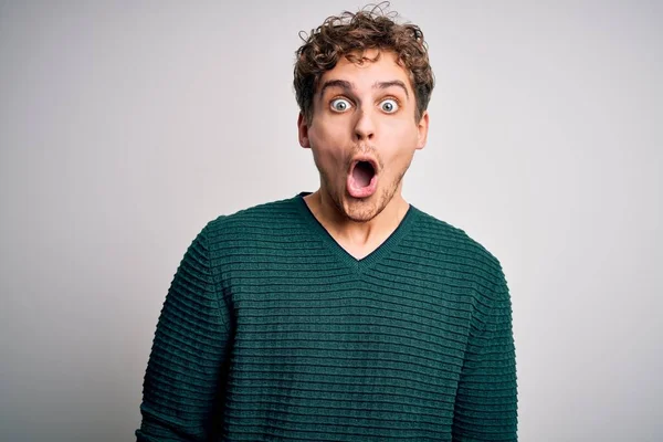 Young Blond Handsome Man Curly Hair Wearing Green Sweater White — Stock fotografie