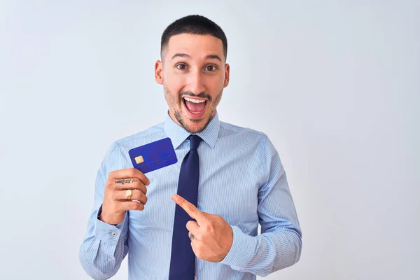 Young Business Man Holding Credit Card Isolated Background Very Happy — Stock Photo, Image