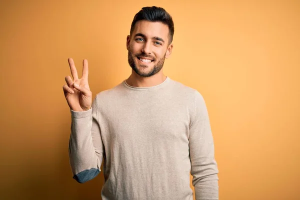 Young Handsome Man Wearing Casual Sweater Standing Isolated Yellow Background — Stock Photo, Image