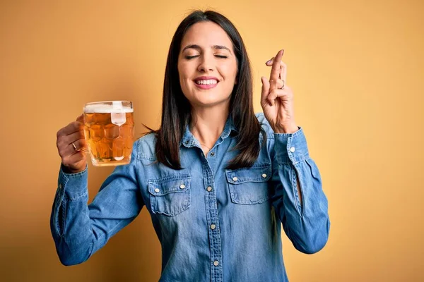 Young Woman Blue Eyes Drinking Jar Beer Standing Isolated Yellow — Stock Photo, Image