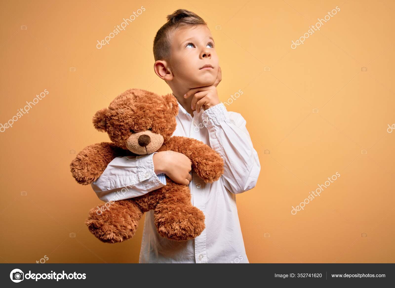 hugging stuffed animal