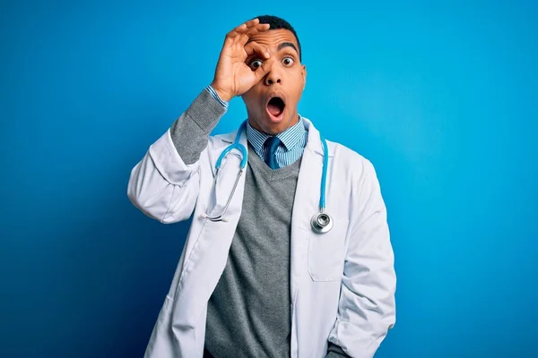 Handsome African American Doctor Man Wearing Coat Stethoscope Blue Background — Stock Photo, Image