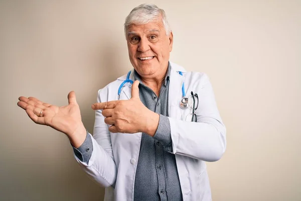 Senior Handsome Hoary Doctor Man Wearing Coat Stethoscope White Background — Stock Photo, Image