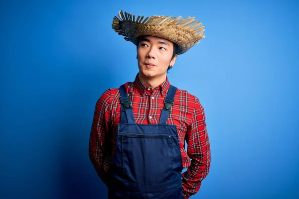 Young Handsome Chinese Farmer Man Wearing Apron Straw Hat Blue — Stock Photo, Image