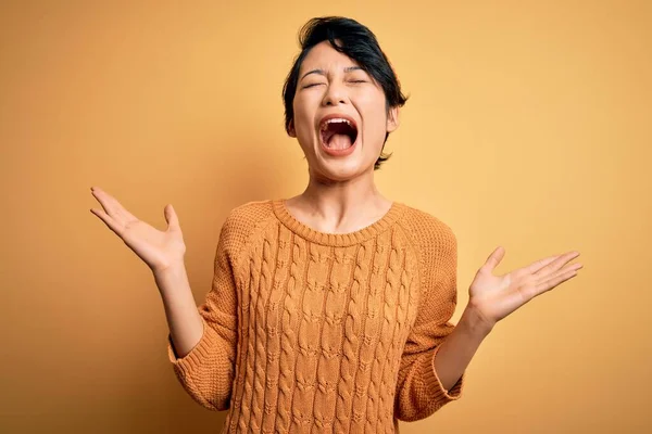 Young Beautiful Asian Girl Wearing Casual Sweater Diadem Standing Yellow — Stock Photo, Image