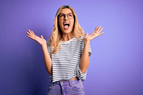 Young Beautiful Blonde Woman Wearing Striped Shirt Glasses Purple Background — Stock Photo, Image