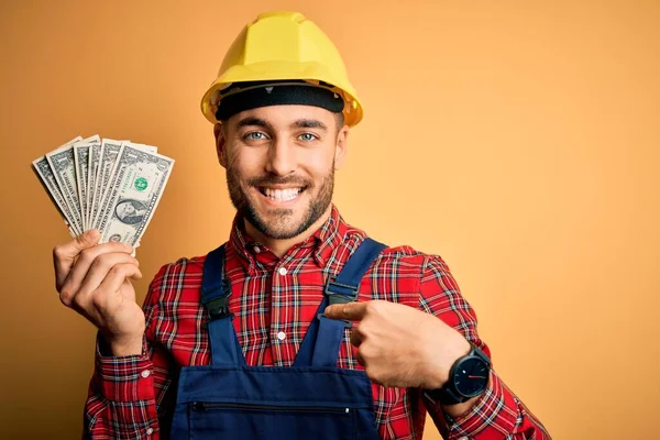 Young Builder Man Wearing Safety Helmet Holding Dollars Payment Yellow — Stock Photo, Image