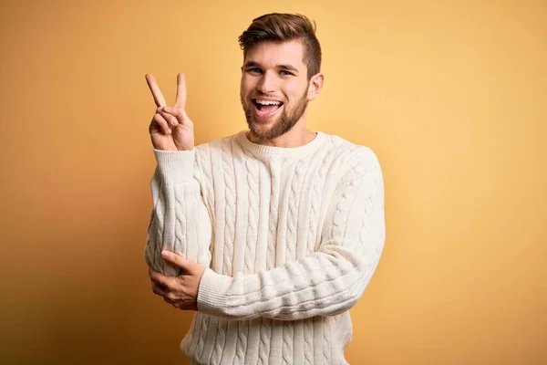 Young Blond Man Beard Blue Eyes Wearing White Sweater Yellow — Stock Photo, Image