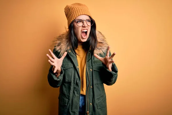 Young Brunette Woman Wearing Glasses Winter Coat Hat Yellow Isolated — Stock Photo, Image