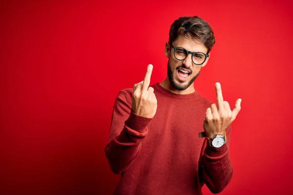 Young Handsome Man Beard Wearing Glasses Sweater Standing Red Background — Stockfoto