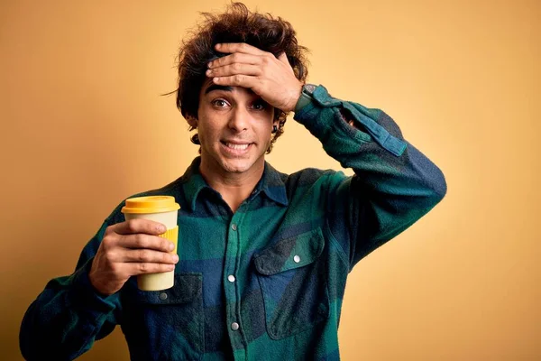 Young Handsome Man Drinking Glass Coffee Standing Isolated Yellow Background — Stock Photo, Image