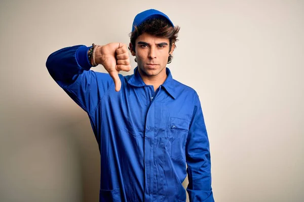 Young Mechanic Man Wearing Blue Cap Uniform Standing Isolated White — Stock Photo, Image