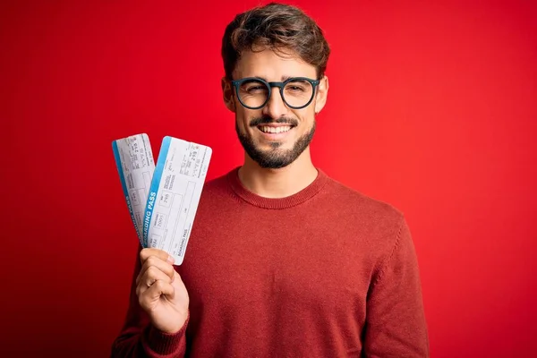 Young Tourist Man Vacation Holding Boarding Pass Standing Red Bakground — Stock Photo, Image