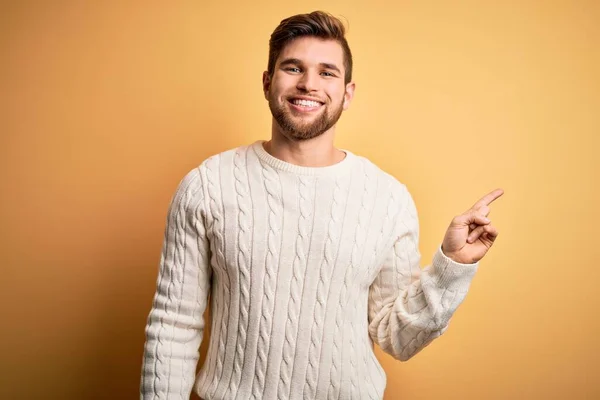 Young Blond Man Beard Blue Eyes Wearing White Sweater Yellow — Stock Photo, Image