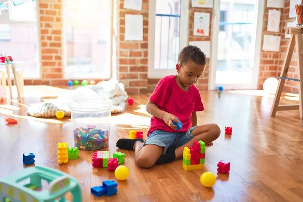 Adorable Toddler Playing Building Blocks Lots Toys Kindergarten — Stock Photo, Image