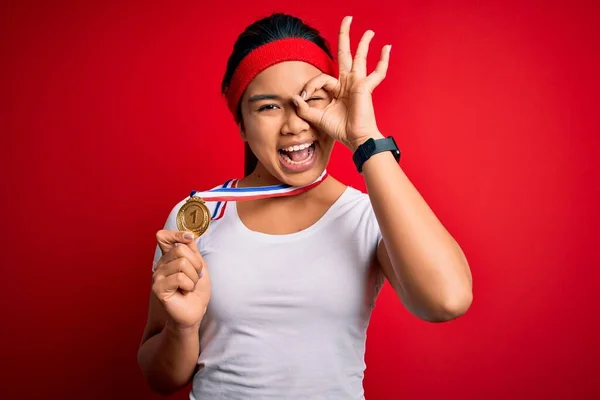 Young Asian Champion Girl Winning Medal Standing Isolated Red Background — Stock Photo, Image