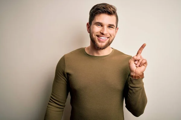 Young Blond Man Beard Blue Eyes Wearing Green Sweater White — Stock Photo, Image