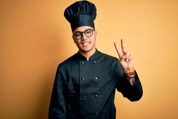 Young Brazilian Chef Man Wearing Cooker Uniform Hat Isolated Yellow — Stock Photo, Image