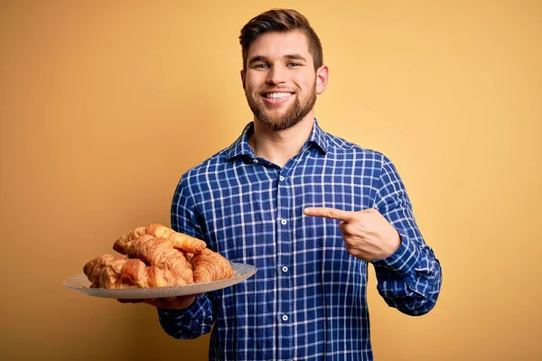 Young Blond Man Beard Blue Eyes Holding Plate French Croissants — Stock Photo, Image