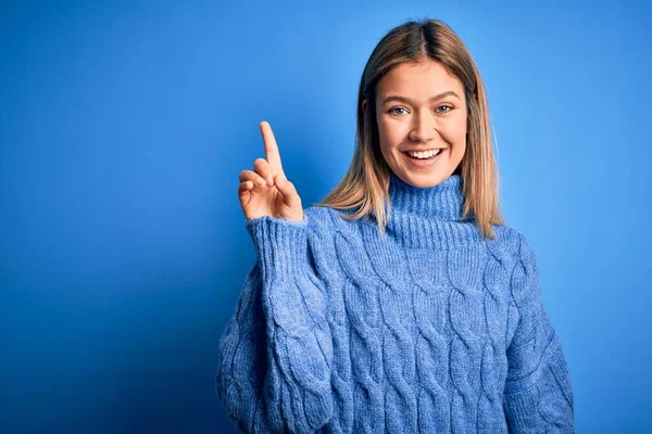 Young Beautiful Blonde Woman Wearing Winter Wool Sweater Blue Isolated — Stock Photo, Image