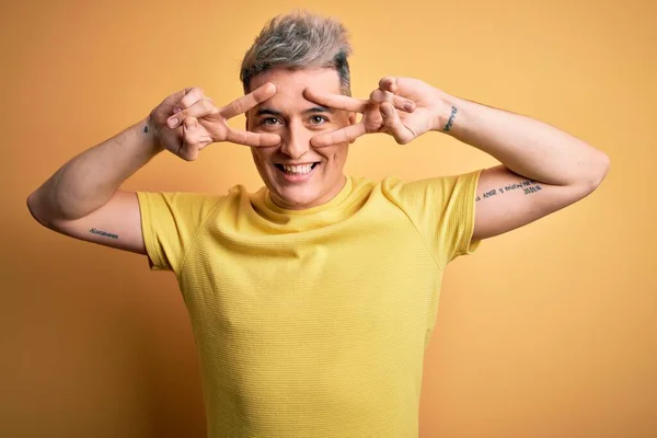 Young Handsome Modern Man Wearing Yellow Shirt Yellow Isolated Background — Stock Photo, Image