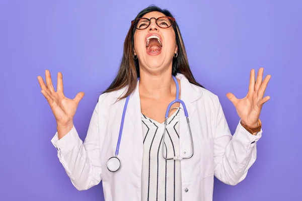 Professional Doctor Woman Wearing Stethoscope Medical Coat Purple Background Crazy — Stock Photo, Image