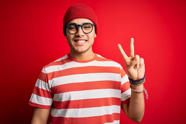 Young Brazilian Man Wearing Casual Striped Shirt Glasses Isolated Red — Stock Photo, Image