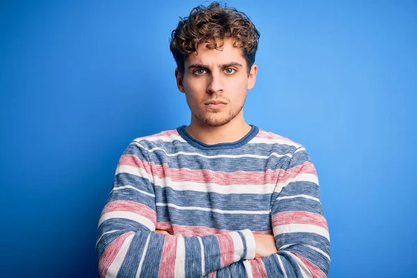 Young Blond Handsome Man Curly Hair Wearing Striped Sweater Blue — Stock Photo, Image