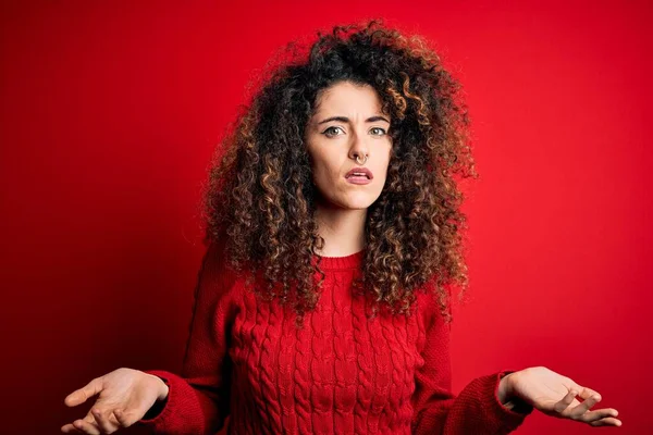 Young Beautiful Woman Curly Hair Piercing Wearing Casual Red Sweater — Stock Photo, Image