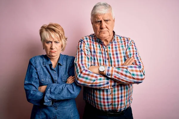 Senior Beautiful Couple Standing Together Isolated Pink Background Skeptic Nervous — Stock Photo, Image