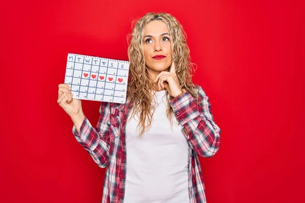Young Beautiful Blonde Woman Holding Period Calendar Controlling Menstrual Cycle — Stock Photo, Image