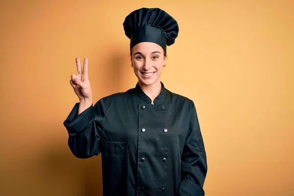 Young Beautiful Chef Woman Wearing Cooker Uniform Hat Standing Yellow — Stock Photo, Image