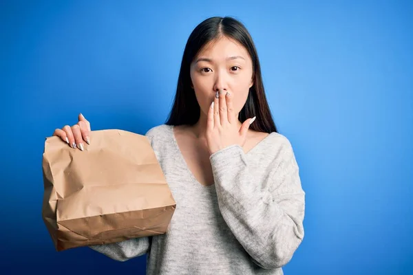 Young Asian Woman Holding Delivery Paper Bag Takeaway Food Blue — Stock Photo, Image