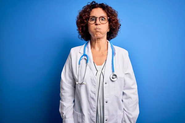 Middle Age Curly Hair Doctor Woman Wearing Coat Stethoscope Blue — Stock Photo, Image