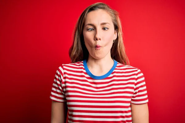Young Beautiful Blonde Woman Wearing Casual Striped Shirt Isolated Red — ストック写真