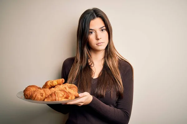 Young Beautiful Girl Holding Plate Sweet Croissants Breakfast White Background — Stock Photo, Image