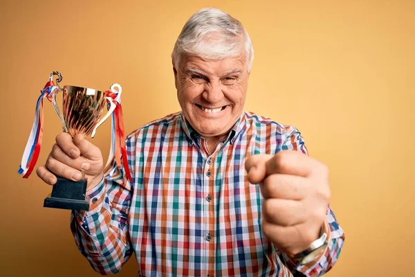 Senior Handsome Hoary Champion Man Holding Trophy Award Victory Yellow — Stock Photo, Image