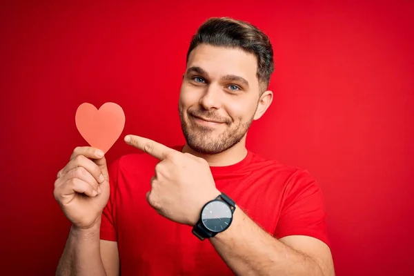 Young Romantic Man Blue Eyes Holding Red Heart Paper Shaped — Stock Photo, Image