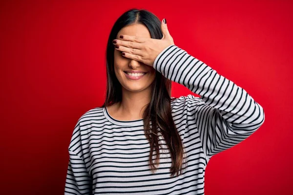 Young Beautiful Brunette Woman Wearing Casual Striped Shirt Red Background — Stock Photo, Image