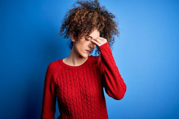 Young Beautiful Woman Curly Hair Piercing Wearing Casual Red Sweater — 图库照片