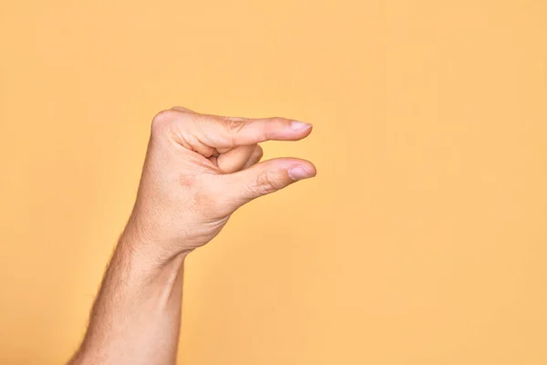 Hand Caucasian Young Man Showing Fingers Isolated Yellow Background Picking — Stock Photo, Image