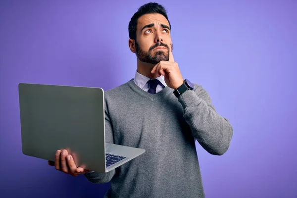 Young Handsome Businessman Beard Working Using Laptop Purple Background Serious — Stock Photo, Image