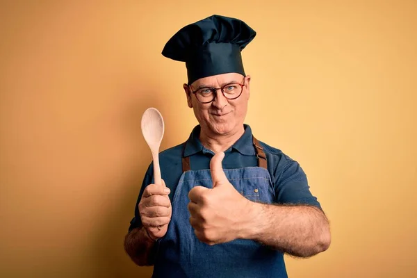 Middle Age Cooker Man Wearing Apron Hat Holding Wooden Spoon — Stock Photo, Image