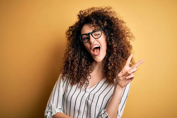 Young Beautiful Woman Curly Hair Piercing Wearing Striped Shirt Glasses — Stock Photo, Image