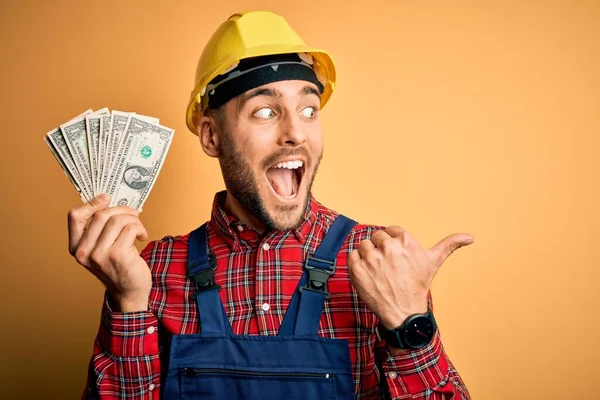 Young Builder Man Wearing Safety Helmet Holding Dollars Payment Yellow — Stock Photo, Image